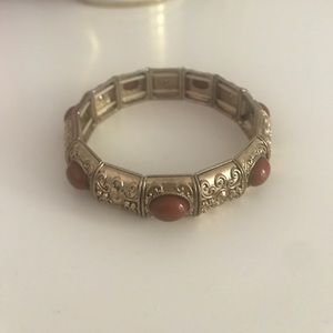 Gold boho chic bracelet with orange stones